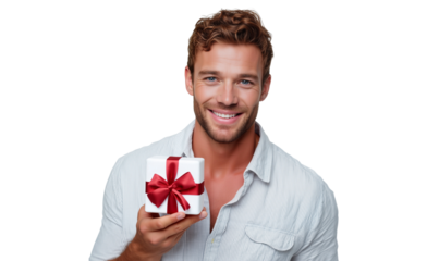 Young handsome man holding a gift box with happy expression, isolated on transparent background
