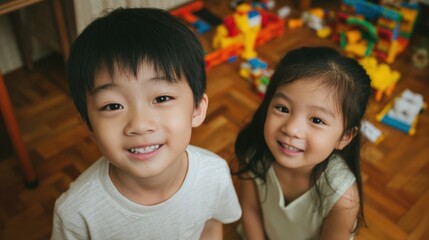 asian children are in a good mood, relaxed, happy, recreation, living room, childhood, lifestyle, preschooler, study, family,
