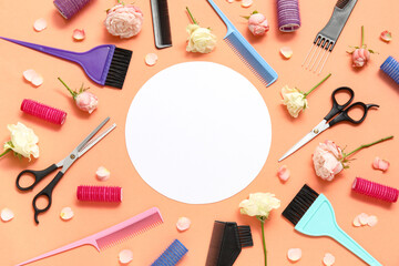 Set of hairdresser's accessories with roses and blank card on orange background