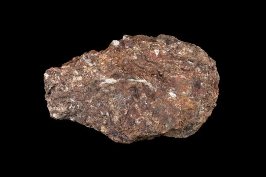 Sample of chlorargyrite, silver ore from the Purple Passion mine in Wickenberg, Arizona. Sample shown is several pounds in weight. Displayed with black background. 
