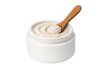 Body scrub developing with wooden spoon in white jar
