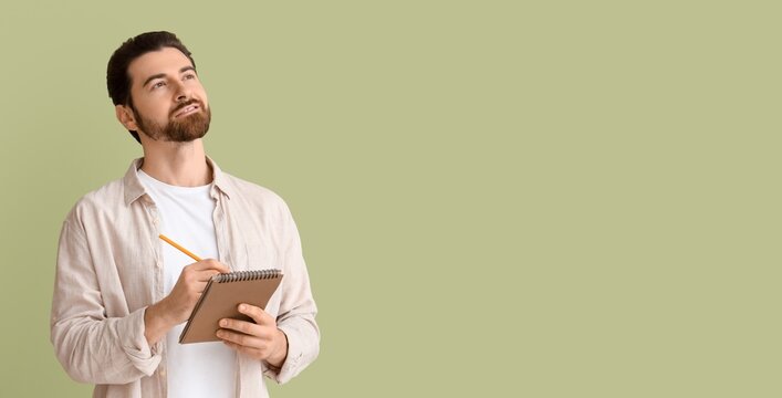Thoughtful man writing in notebook on green background with space for text