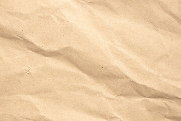 Abstract crumpled and creased recycle brown paper texture background