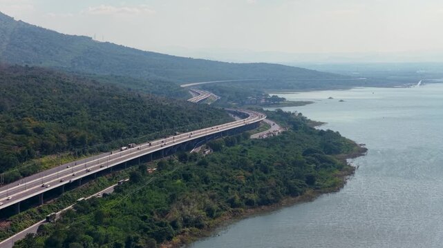 Aerial View of Elevated Motorway Along Lam Takhong Lake in Thailand