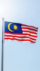 Malaysia Flag Waving Under Clear Sky