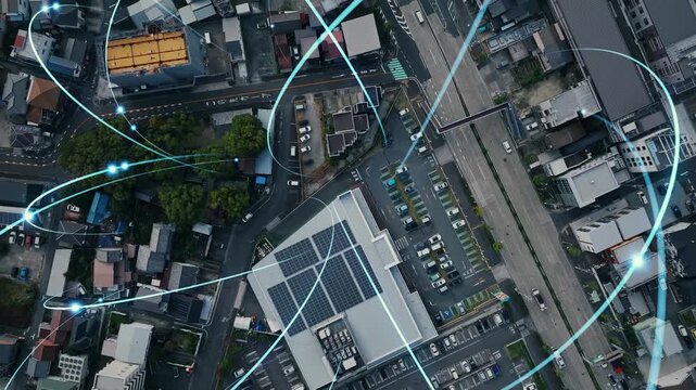 現代都市と道路の真俯瞰ドローン空撮と通信ネットワークのコンセプト