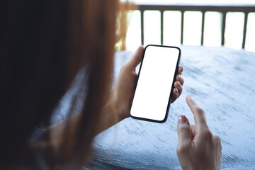 Cell phone mockup, woman hands holding using mobile phone with blank screen for online marketing or...