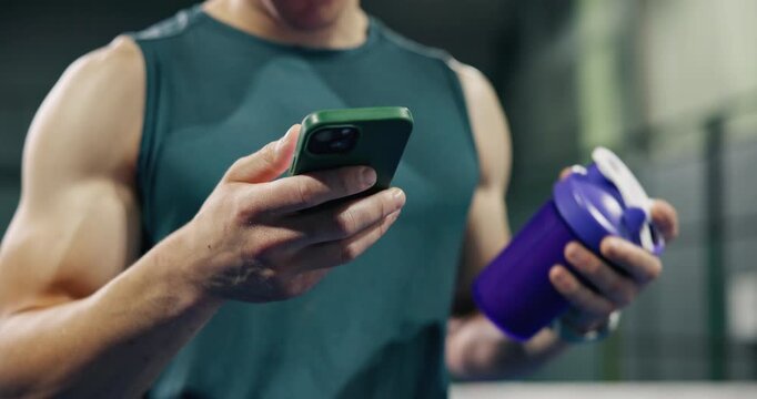 Hands, protein shake or man in gym, cellphone or digital app for nutrition info. Closeup, person or athlete in wellness center, supplement drink or checklist for diet plan, exercise or health website