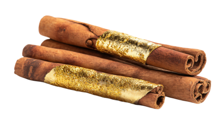 Luxurious gold wrapped cinnamon sticks on black background