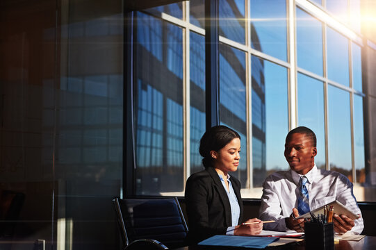 Business, black people and discussion in office with tablet, property website and plan for real estate. Space, realtor team and talking in workplace with tech, client email and meeting for feedback.