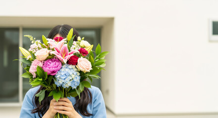 Anonymous Woman Hiding Face Behind Flowers