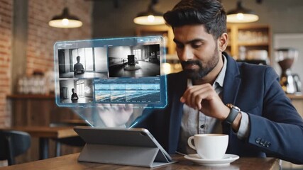 Man Monitoring Security Cameras Hologram on Tablet in Cafe - Powered by Adobe