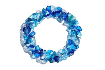 A circular arrangement of irregular, translucent blue and white stones, suggesting ocean