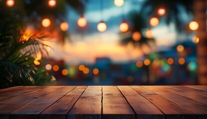Blurred background of an outdoor wooden table with colorful bokeh lights and palm leaves at sunset outdoor setting