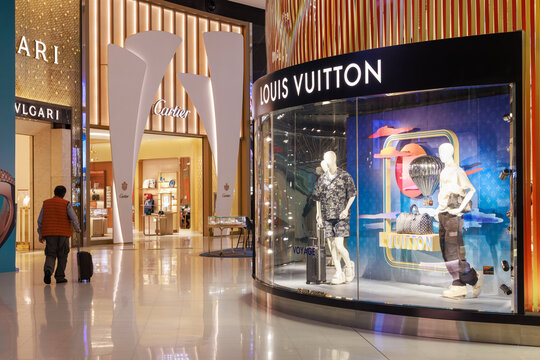 A Louis Vuitton store in Sydney International Airport, Sydney, Australia, with Bulgari and Cartier shops in the background. June 11, 2024