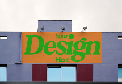 Blank horizontal billboard poster on a storefront wharehouse facade