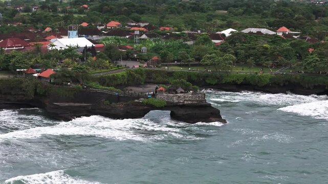 Batu Bolong Temple, slow motion drone view, Bali Indonesia