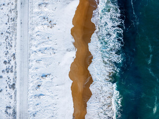 Winter landscape of Black Sea coast at Alepu driver's beach under snow.