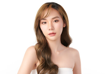 A beautiful young Asian woman with clean, fresh skin against a white background. Skincare, facial treatment, cosmetology, beauty, and spa. An elegant portrait of an Asian woman.