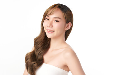 A beautiful young Asian woman with clean, fresh skin against a white background. Skincare, facial treatment, cosmetology, beauty, and spa. An elegant portrait of an Asian woman.
