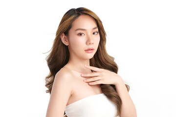 A beautiful young Asian woman with clean, fresh skin against a white background. Skincare, facial treatment, cosmetology, beauty, and spa. An elegant portrait of an Asian woman.