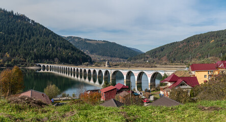 Scenic Arched Viaduct Crossing In Romanian Mountains
