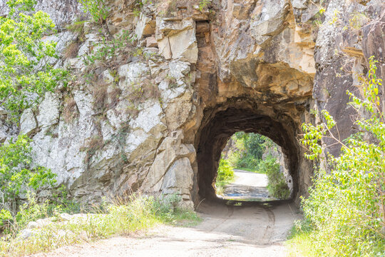 Tunnel through solid rock hand dug during the 1800's on the old grafton road