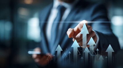 Businessman pointing at a group of glowing arrows symbolizing business growth, financial success, market increase, and upward performance trend.
