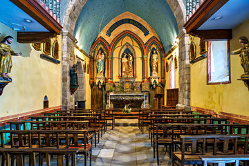 Obraz premium Interior of the church Notre Dame du Bon Port in the mountain village Gavarnie-Gedre in Hautes-Pyrenees, France.