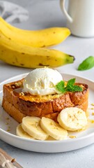 French toast topped with ice cream and banana slices served on a white plate against a light background