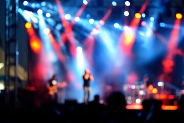 Blurred Background of Rock Concert with a Symphony Orchestra Performance