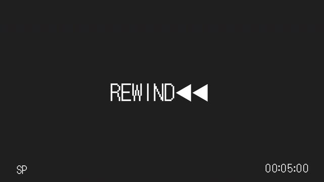 VHS tape playing with white text saying rewind. Ideal for video editing projects, creating retrothemed content, and social media posts.