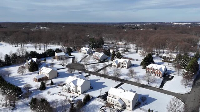 Arial view of a single-family house residential community after snow in Garnet Valley, suburb of Philadelphia