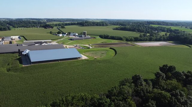 Aerial view of agricultural fields, barns and silos on farms in Cochranville, southeastern Pennsylvania