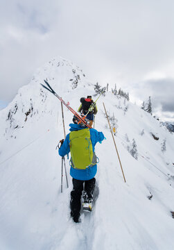 Crossing The Ridge To Ski The Summit