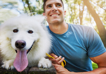 Happy, morning and man with dog in park for fresh air, wellness and bonding for care. Nature, portrait and person smile with pet for love, trust and loyalty for health, exercise and relax outdoor