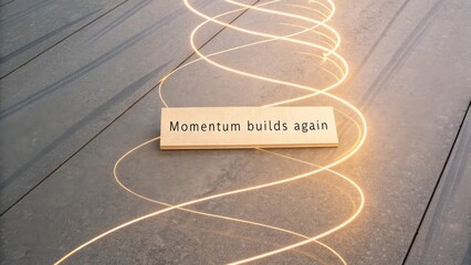 Glowing spiral line of momentum over wooden board