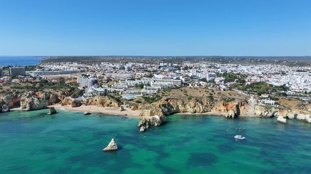 Aerial video from the natural rocks near Lagos in the Algarve Portugal