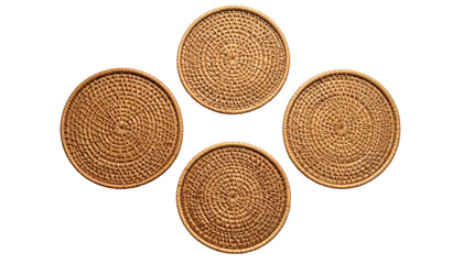 Four round, woven coasters arranged in a diamond shape on a stark black background