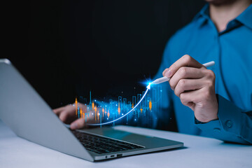 Business professional using laptop and digital pen to analyze rising data chart, financial growth analytics, investment performance, stock market trend, business strategy concept for digital success.