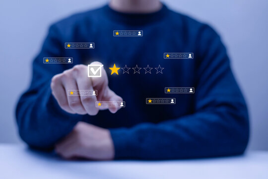 Businessman selecting five star rating with digital feedback interface, customer satisfaction concept, online review system, service evaluation, and quality assurance for modern business growth.