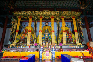 Fototapeta premium The SanQing Hall statue in Taiqing Palace of Zhoukou City, Henan Province, China. This is the birthplace of Laozi and the main ancestral temple revered by all major Taoist sects. 