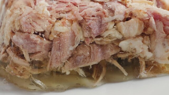 Prepared homemade beef aspic on plate. High quality 4k footage