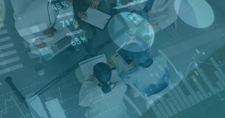 Business data and graphs animation over diverse professionals working in office - Powered by Adobe