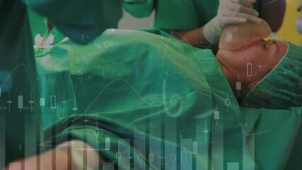 Animation of digital interface over surgeons in operating theatre - Powered by Adobe