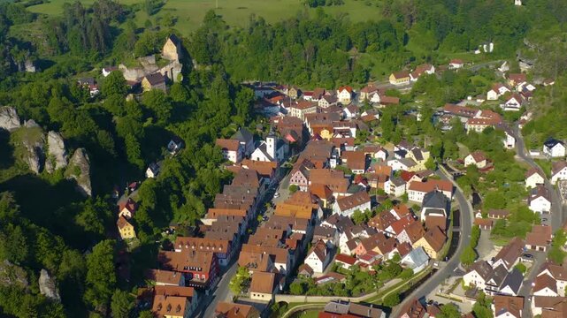 Panoramic aerial view of the old town and city Pottenstein in Germany on a sunny morning in spring. 