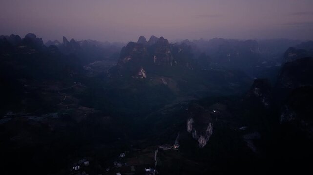 Sunrise aerial view of karst landscape near Xianggong Mountain, Yangshuo, Guilin, China