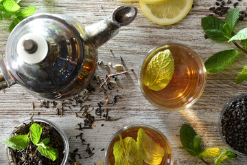 Detail of green tea in glass cups on kitchen table