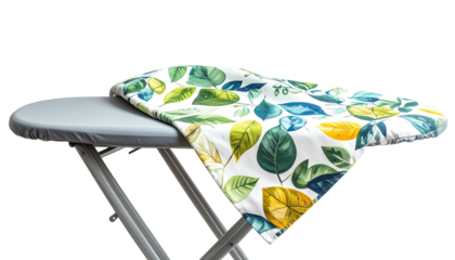 Ironing board with floral ironing board cover. Bright green and blue leaves design