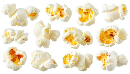 Isolated fluffy popcorn kernels of varying shapes against a stark black background
